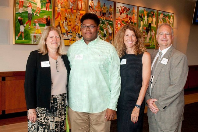 Cathy McLaughlin and Barbara Raffaldini of the NC Fine Wines Society along with 2017 Scholarship Winner Wille Leak, Jr.